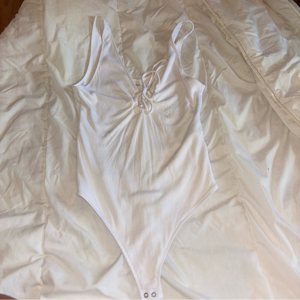 Abercrombie & Fitch white ribbed lace-up bodysuit, size M.